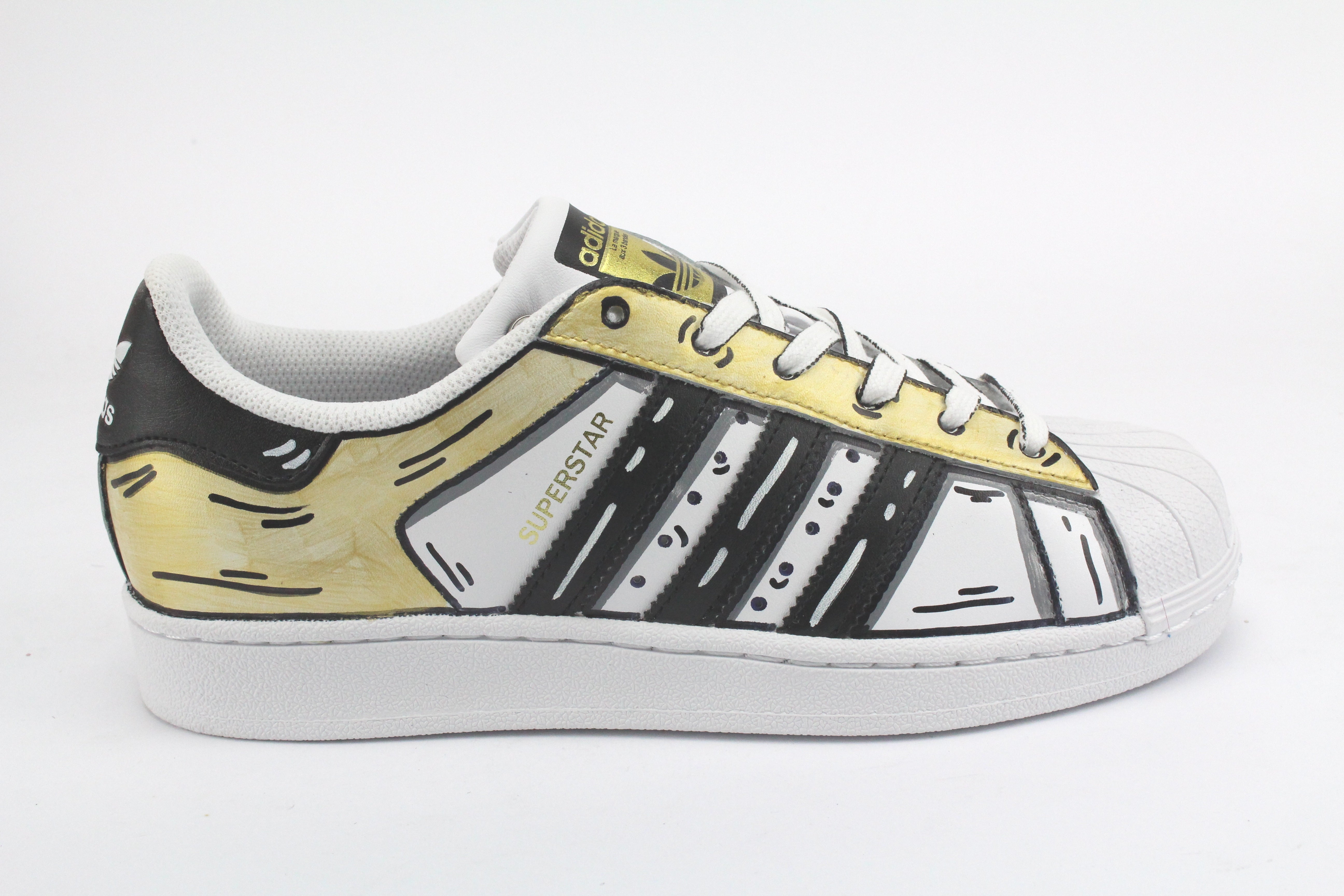 Adidas Superstar Cartoon Gold e lacci cartoon