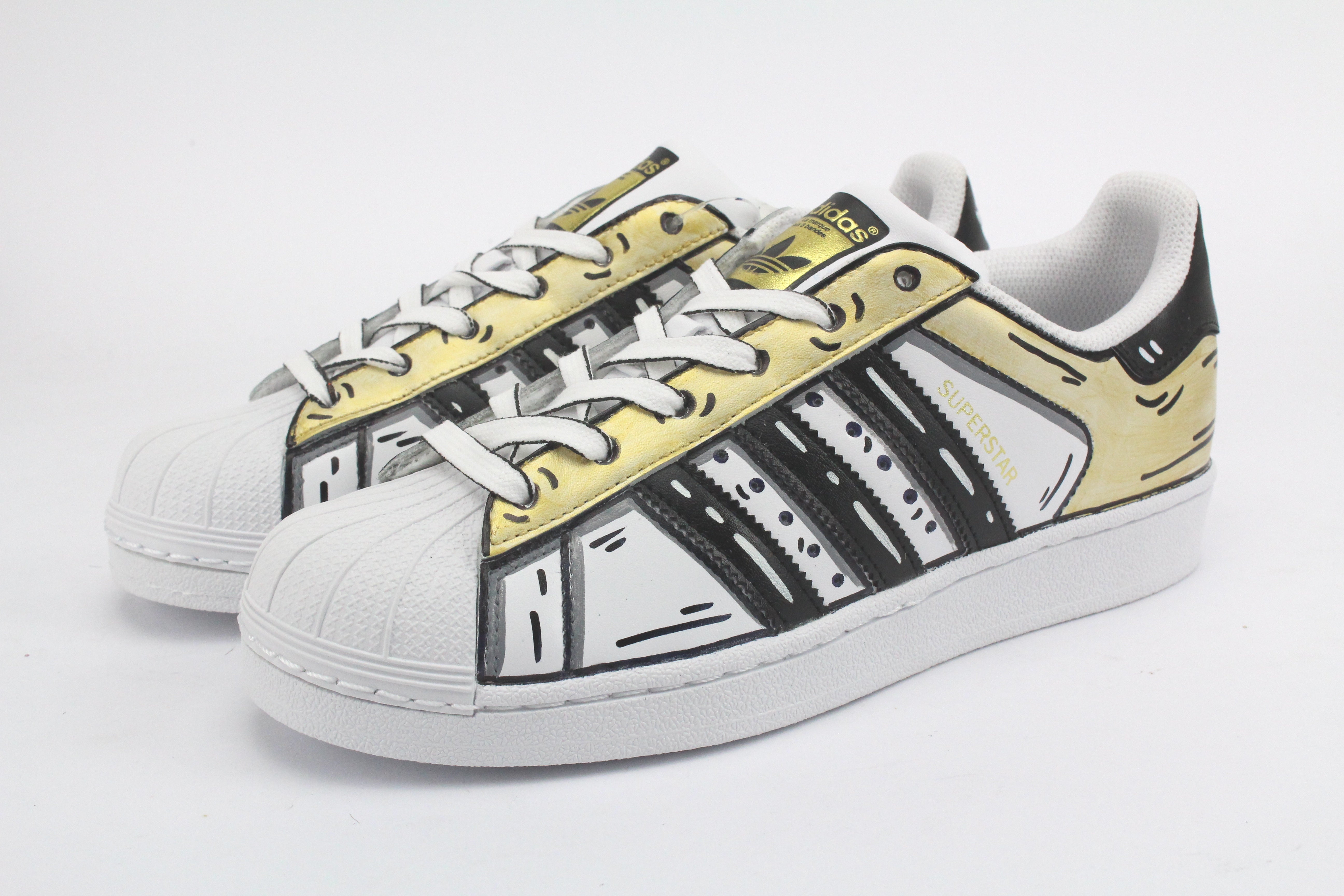 Adidas Superstar Cartoon Gold e lacci cartoon